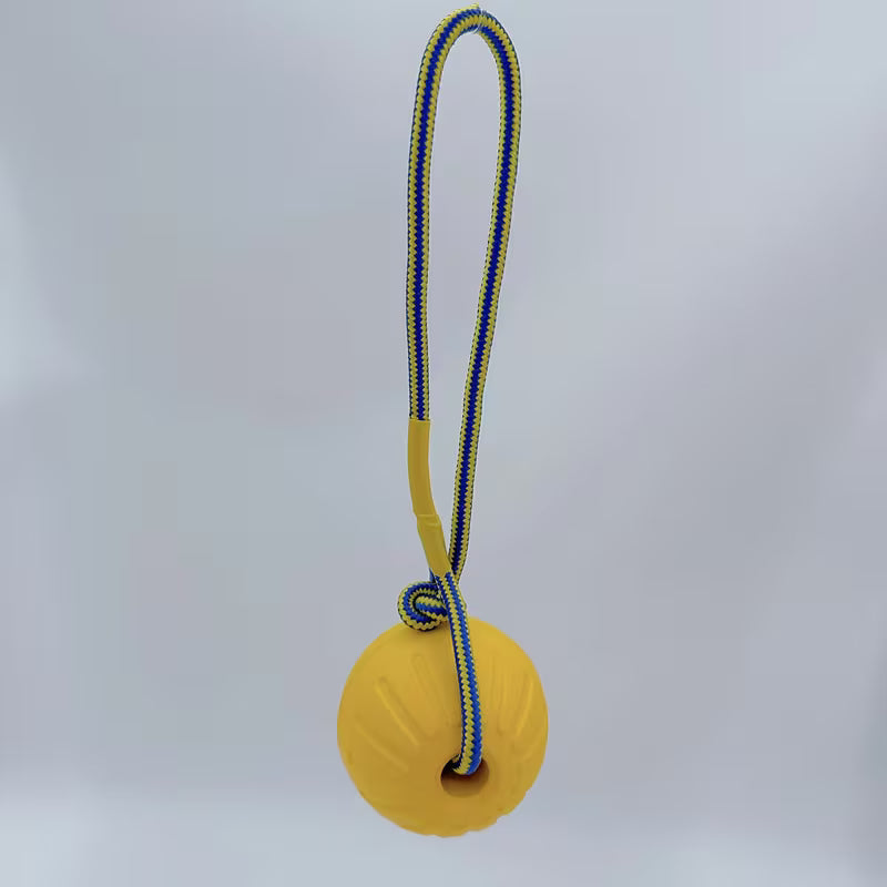 Gele Bal met touw speeltje ( 9cm)